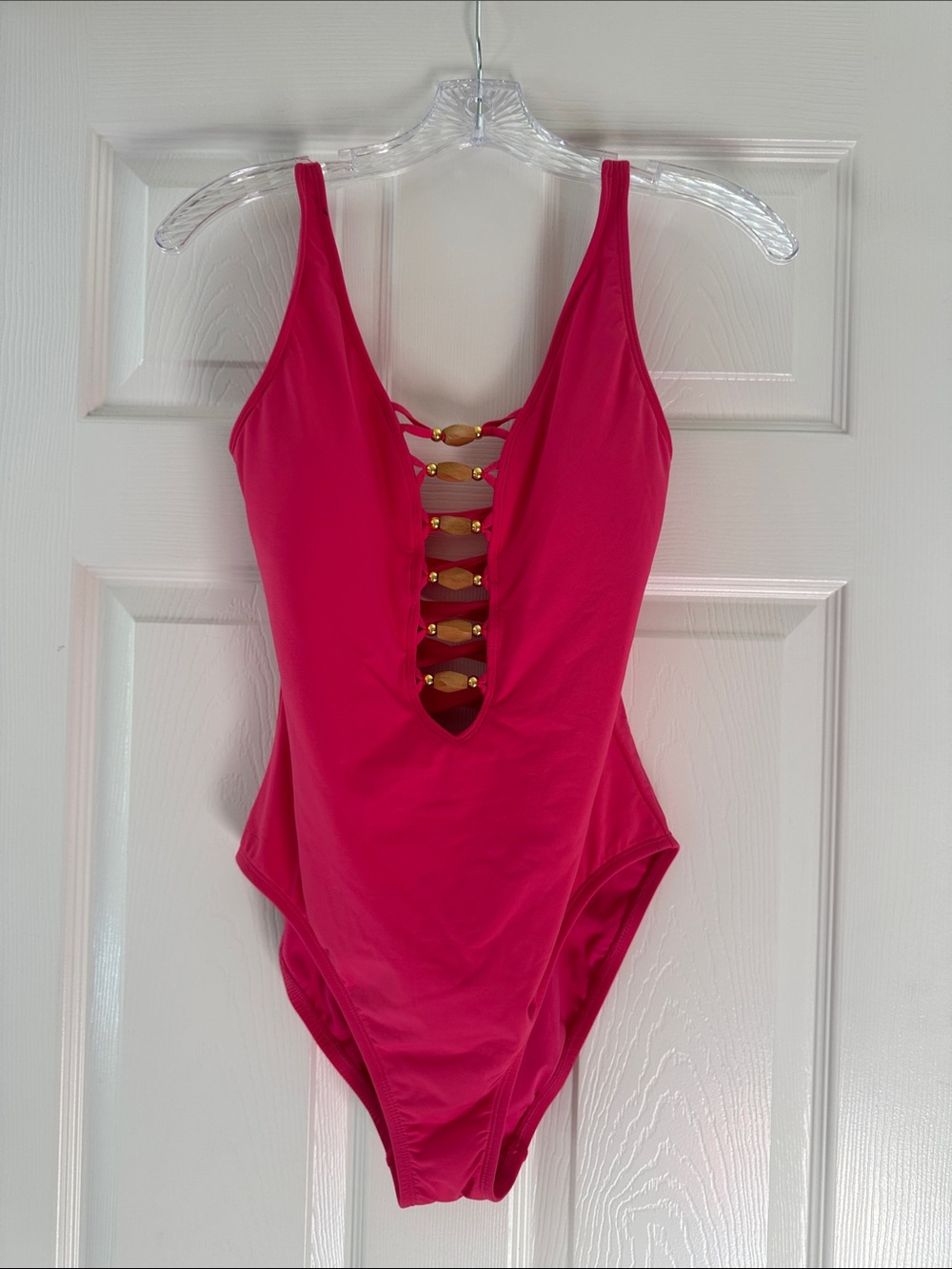 Bleu Rod Beattie Hot Pink One-Piece Swimsuit with Gold Accent Ladder Front